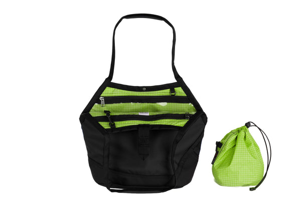 A Swift in Black Ballistic with Kiwi (bright green with white grid) 200 Halcyon interior and Yarn Stuff Sack.